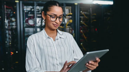 Person using a tablet in a data center