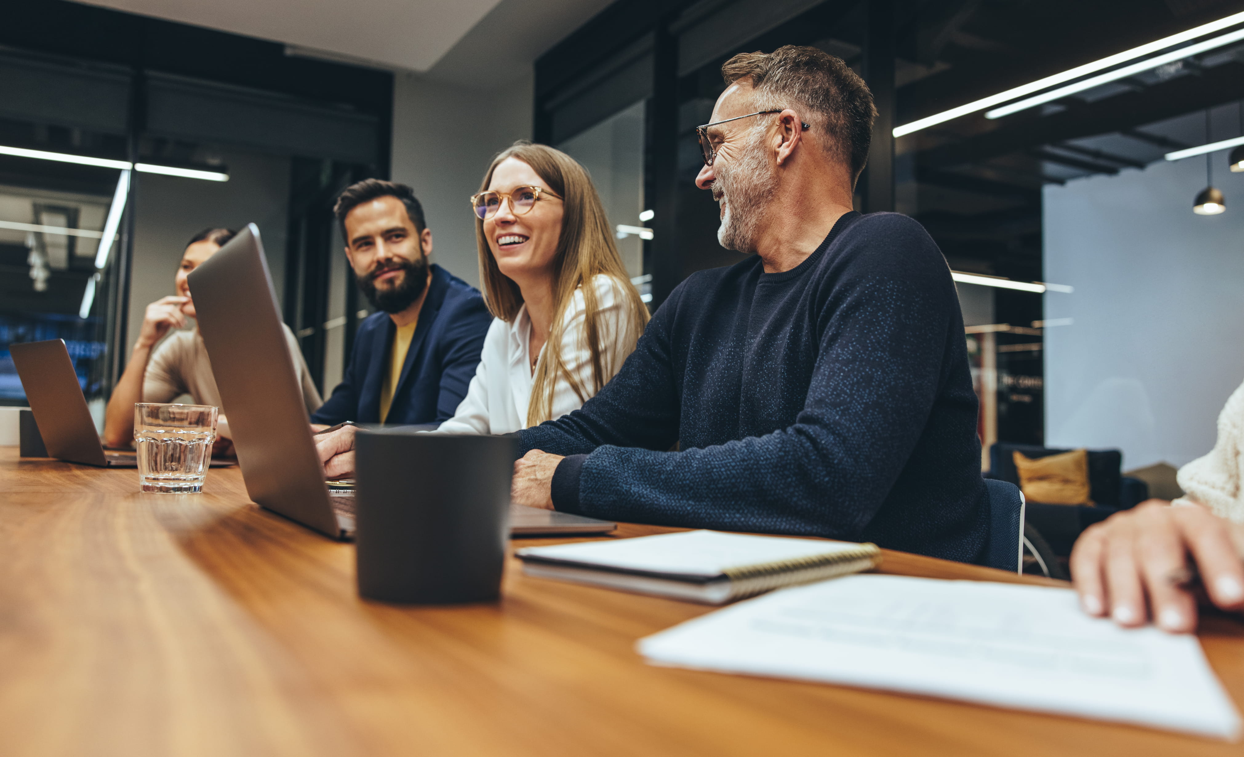 employee with laptop on meeting